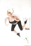 Pigtailed MILF Cherie Deville Takes Off Her Clothes And Teases The Camera With Her Big Tits photos (Michael Vegas)