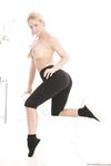 Pigtailed MILF Cherie Deville Takes Off Her Clothes And Teases The Camera With Her Big Tits photos (Michael Vegas)