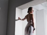 Long-haired Brunette Maddy May Masturbates On The Table