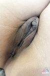 Asian girl with a big booty Kimmy Kimm shows off her shaved pussy up close