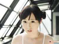 Innocent looking Japanese girl Machiko Ono gets bare naked near an indoor pool