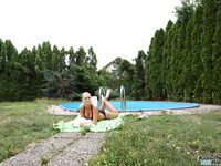 Busty amateur teen Lena getting ass fucked doggystyle by the pool