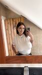 Adorable blue eyed teen with huge juggs Brooke Mills poses in a tight shirt