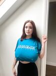 Adorable blue eyed teen with huge juggs Brooke Mills poses in a tight shirt