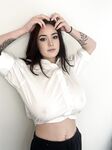 Adorable blue eyed teen with huge juggs Brooke Mills poses in a tight shirt