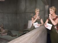 Filthy MILF Simone Sonay and hot blonde Jenna Ashley fist each other in a cell