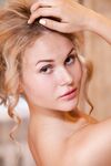 Shapely teen Caroline Abel strips her silky pajamas and shows her big boobs