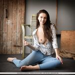 Sweet brunette teen Alisa Amore removes blue jeans on way to modeling naked