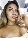 Curvy OnlyFans cam babe Emily Train shows her big ass while taking nudes