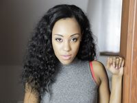 Curly-haired Ebony Noemilk Gets Nicely Fucked With Her Panties On photos (George Lee)