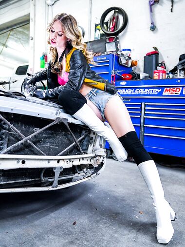 Wavy-haired Hottie With Natural Boobs Gets Fucked In The Garage photos (Anya Olsen)