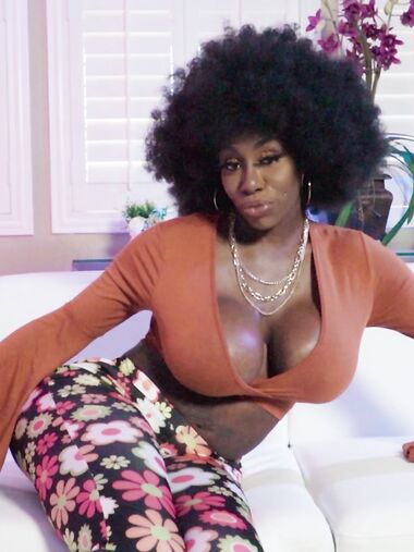Curly-haired Ebony With Big Boobs And Ass Pleasures Her Man On The Sofa photos (Ebony Mystique)