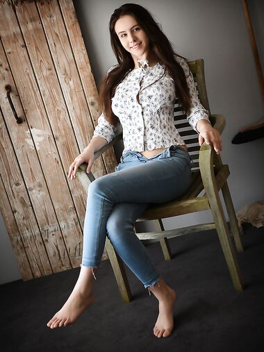 Sweet brunette teen Alisa Amore removes blue jeans on way to modeling naked